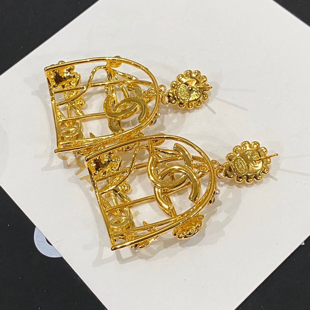 Retor Gold Birdcage Stud Earrings