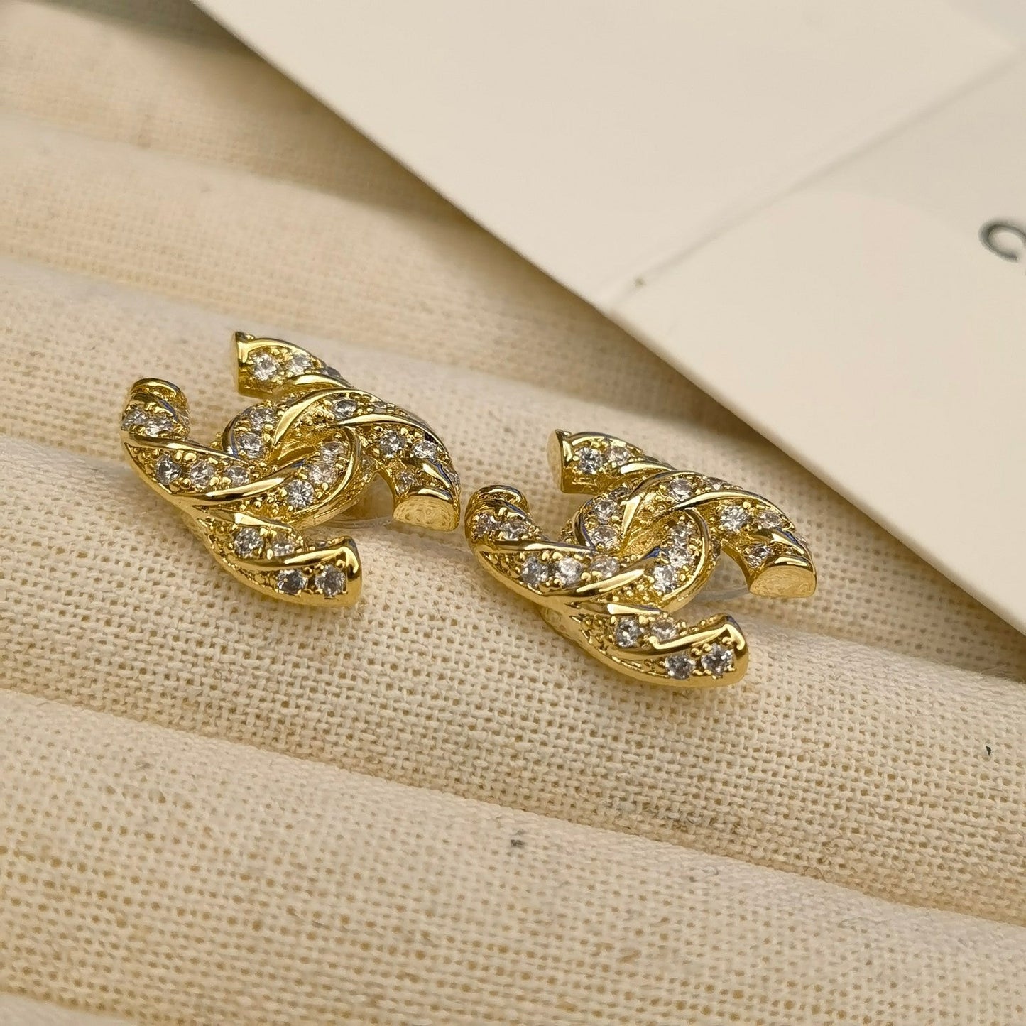 Sparkling Zircon Logo Stud Earrings