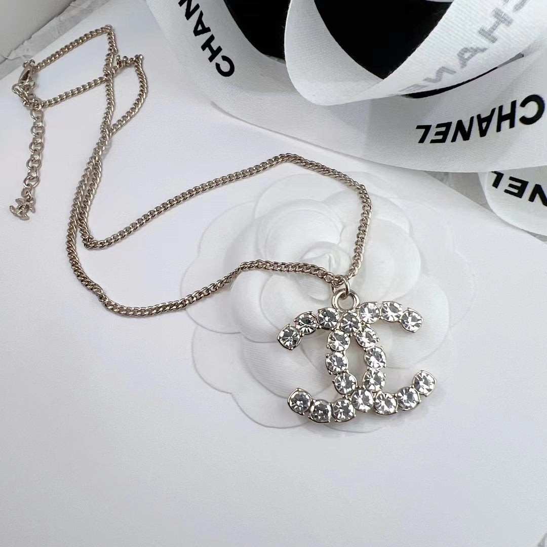 Fashion Crystal Logo Earrings and Necklace