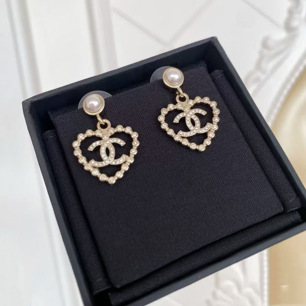 Fashionable Hollow Heart Pendant Earrings